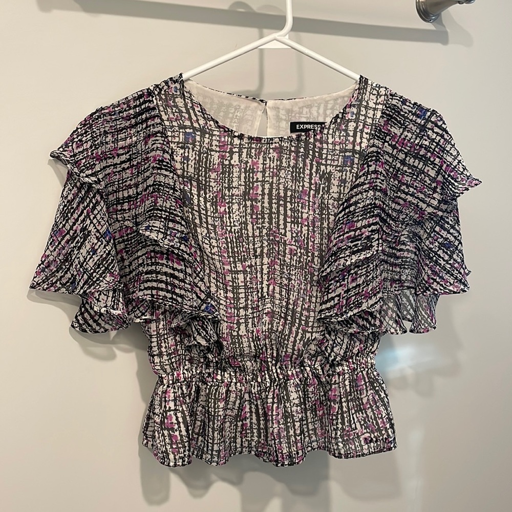 Express size small ruffle shirt, never worn. New without tag.